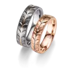 Rotgold und Tantal Eheringe Trauringe Runningleaf und Tanataleinlage Schmuck Ringe Juwelier